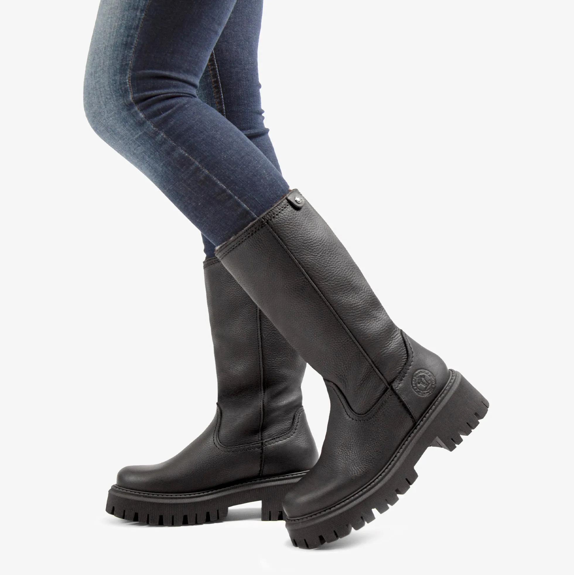 Charlotte Botas de piel con forro interior de pelo.