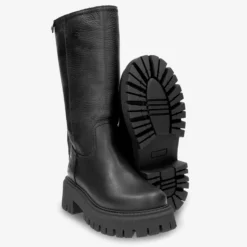 Charlotte Botas de piel con forro interior de pelo.