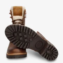 Tibi Botas de piel con forro interior de pelo.