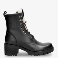 Tibi Botas de piel con forro interior de pelo.