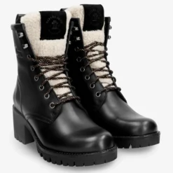 Tibi Botas de piel con forro interior de pelo.