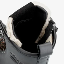 Tibi Botas de piel con forro interior de pelo.