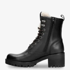 Tibi Botas de piel con forro interior de pelo.